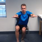 Single leg squat into chair in downward position